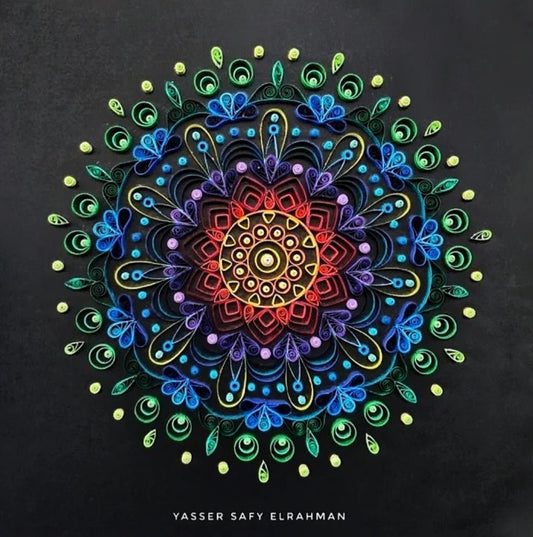 Colorful mandala artwork titled "Kaleidoscope of Peace" by Yasser Safy Elrahman, featuring intricate, vibrant geometric patterns.