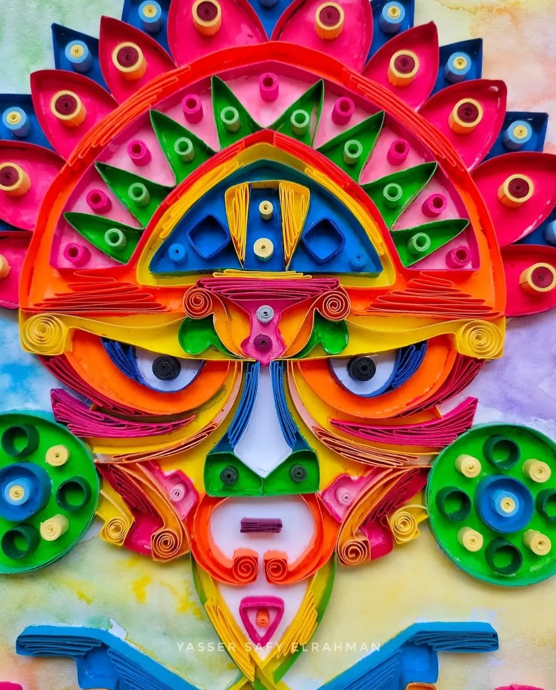 Detailed artwork of Mayan masks from the Ancient Echoes collection by Yasser Safy Elrahman, showcasing vibrant colors and intricate designs.