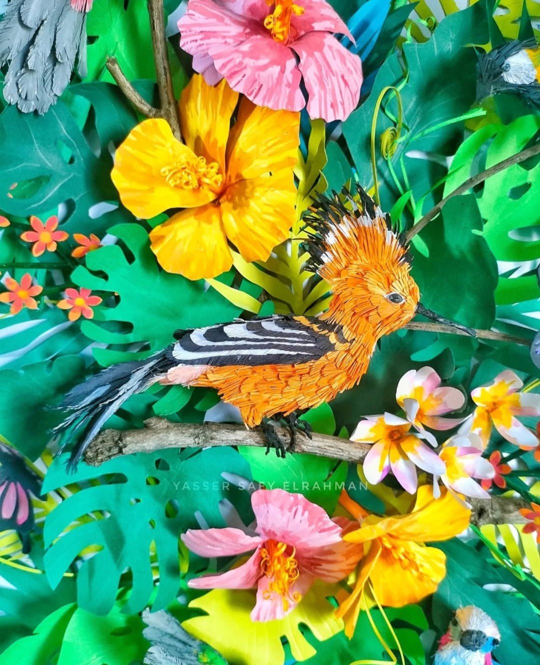 Colorful artwork of tropical birds in Aden, created by Yasser Safy Elrahman, showcasing vibrant bird species in a detailed scene.