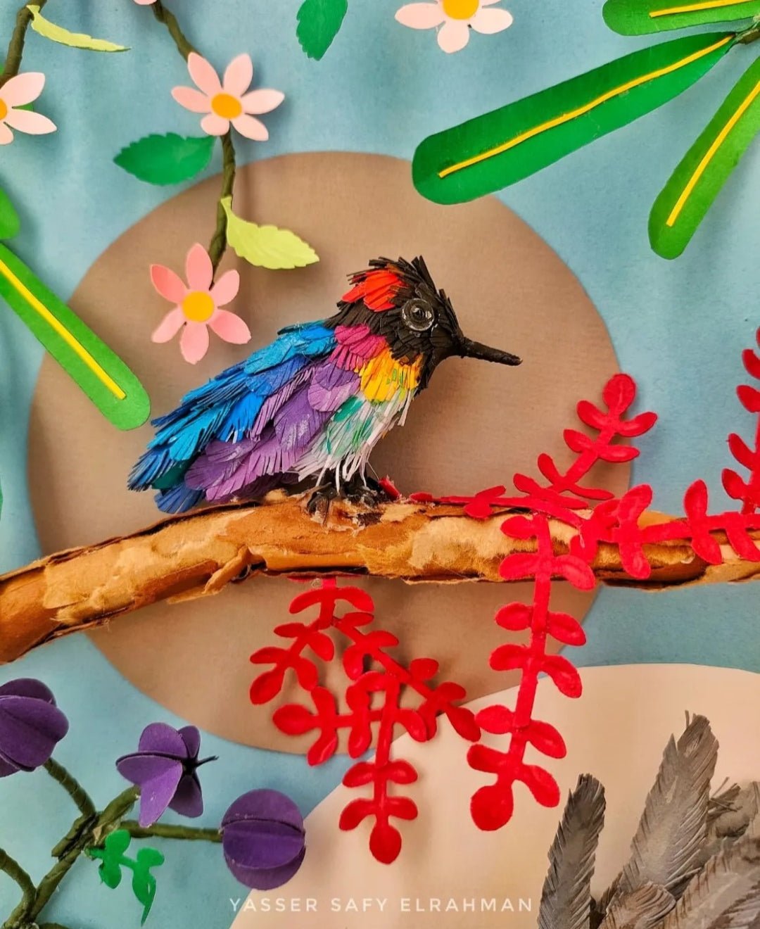 Colorful artwork of garden birds in a lush setting by Yasser Safy Elrahman, depicting feathered visitors in a vibrant garden scene.