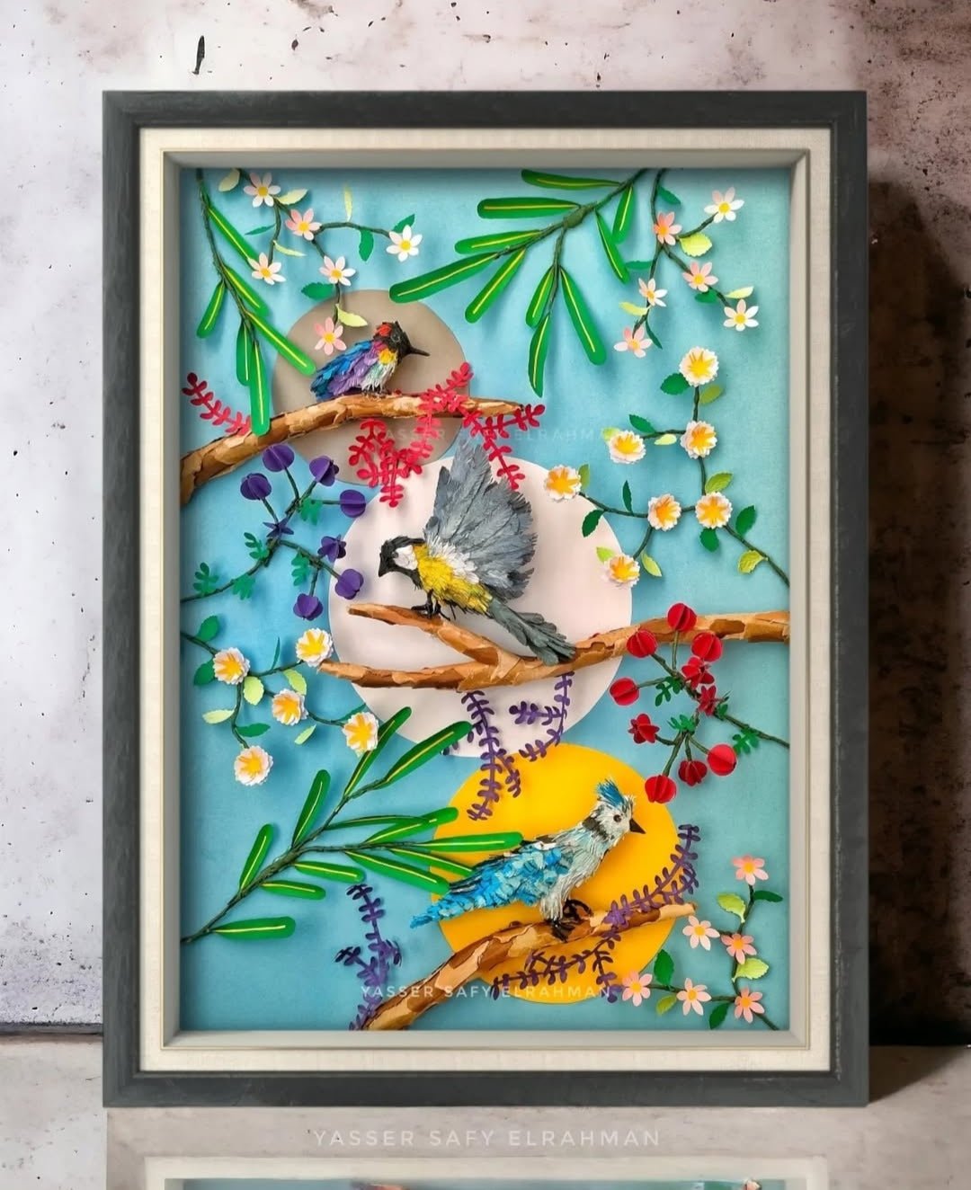 Colorful artwork of garden birds in a lush setting by Yasser Safy Elrahman, capturing vibrant feathered visitors in a detailed scene.