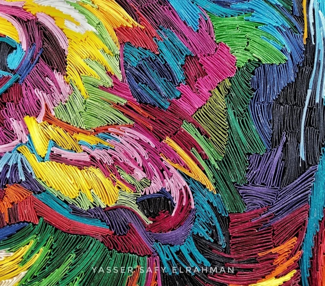 Colorful artwork titled Cassiopea: A Symphony of Loyal Colors by Yasser Safy Elrahman, featuring vibrant, abstract visual design.