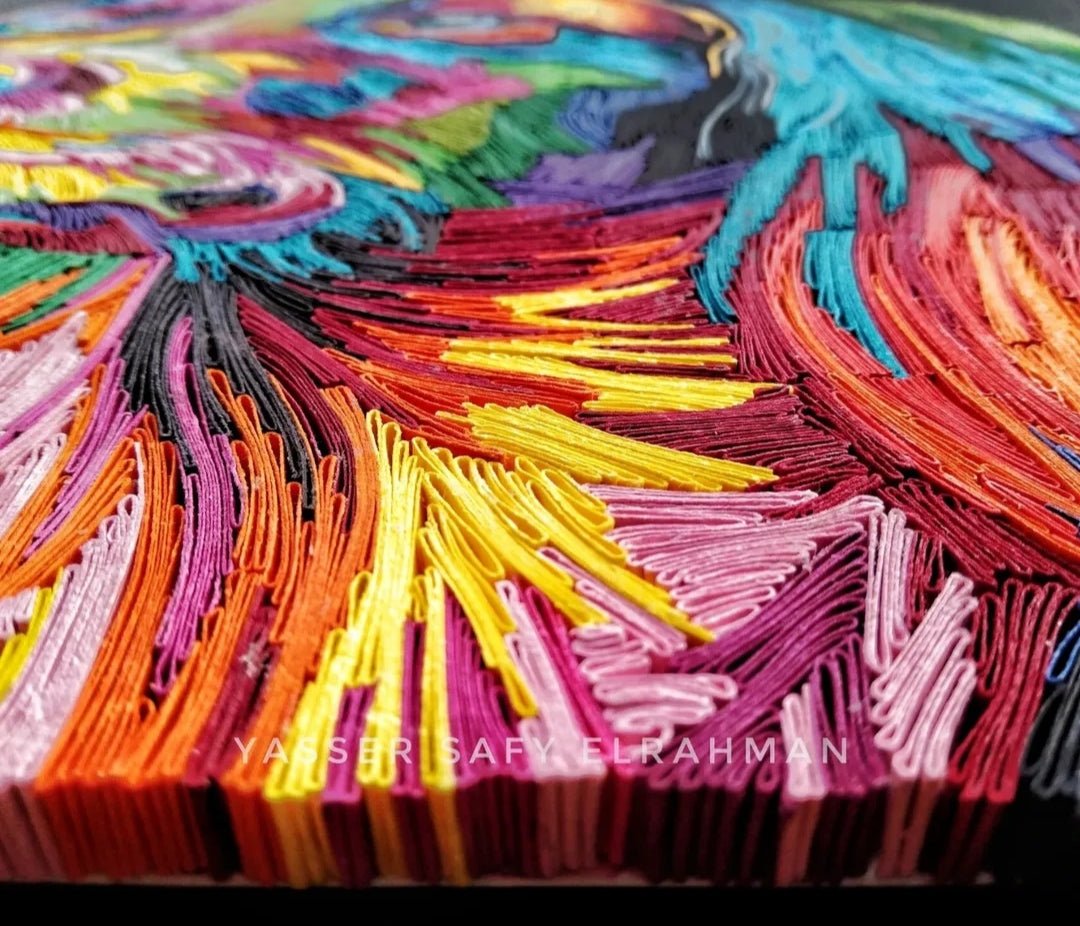 Colorful abstract artwork titled "Cassiopea: A Symphony of Loyal Colors" by Yasser Safy Elrahman, featuring vibrant, harmonious hues.