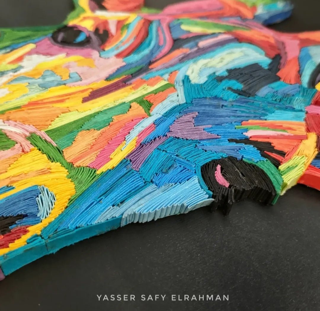 Colorful giraffe artwork by Yasser Safy Elrahman featuring vibrant, abstract hues and graceful design on a white background.