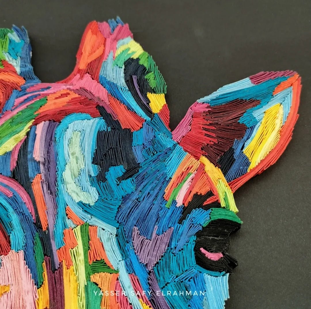 Colorful giraffe artwork by Yasser Safy Elrahman featuring vibrant hues and graceful design, showcasing artistic creativity.