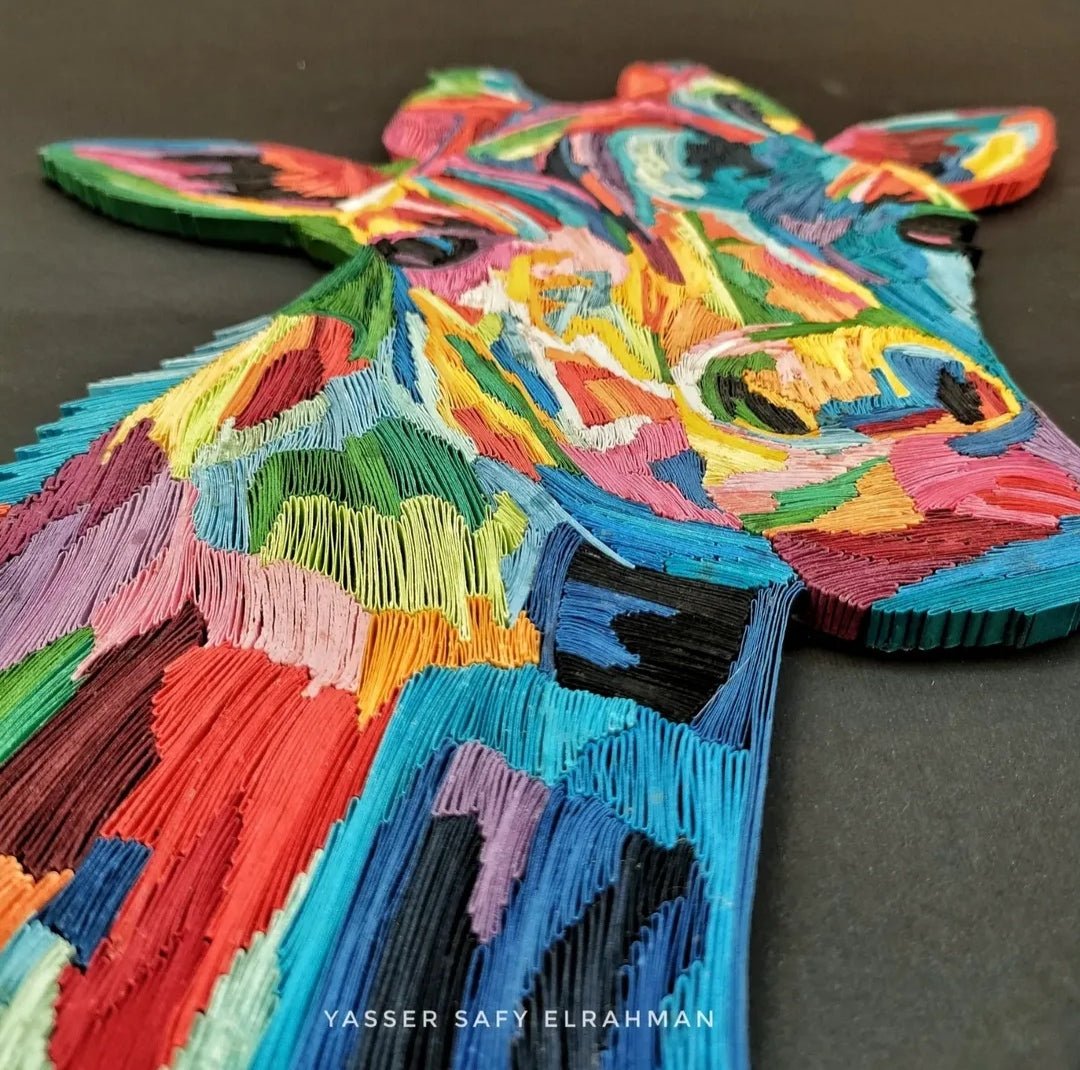 Colorful giraffe artwork by Yasser Safy Elrahman featuring vibrant, abstract hues and graceful animal illustration.