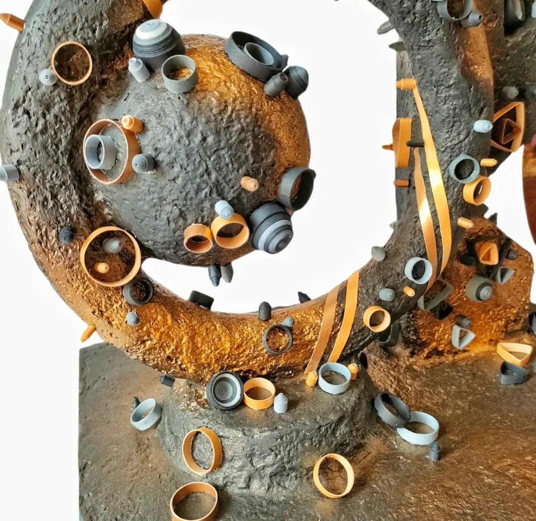 Darkening of the Light sculpture by Yasser Safy Elrahman, abstract art piece with intricate textures and dark-toned features.