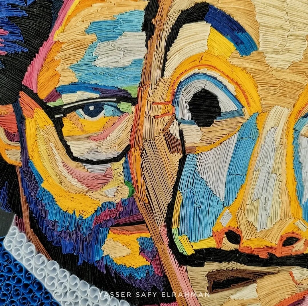 Colorful portrait artwork titled El Profesor: A Mastermind by Yasser Safy Elrahman, featuring vibrant and detailed artistic design.