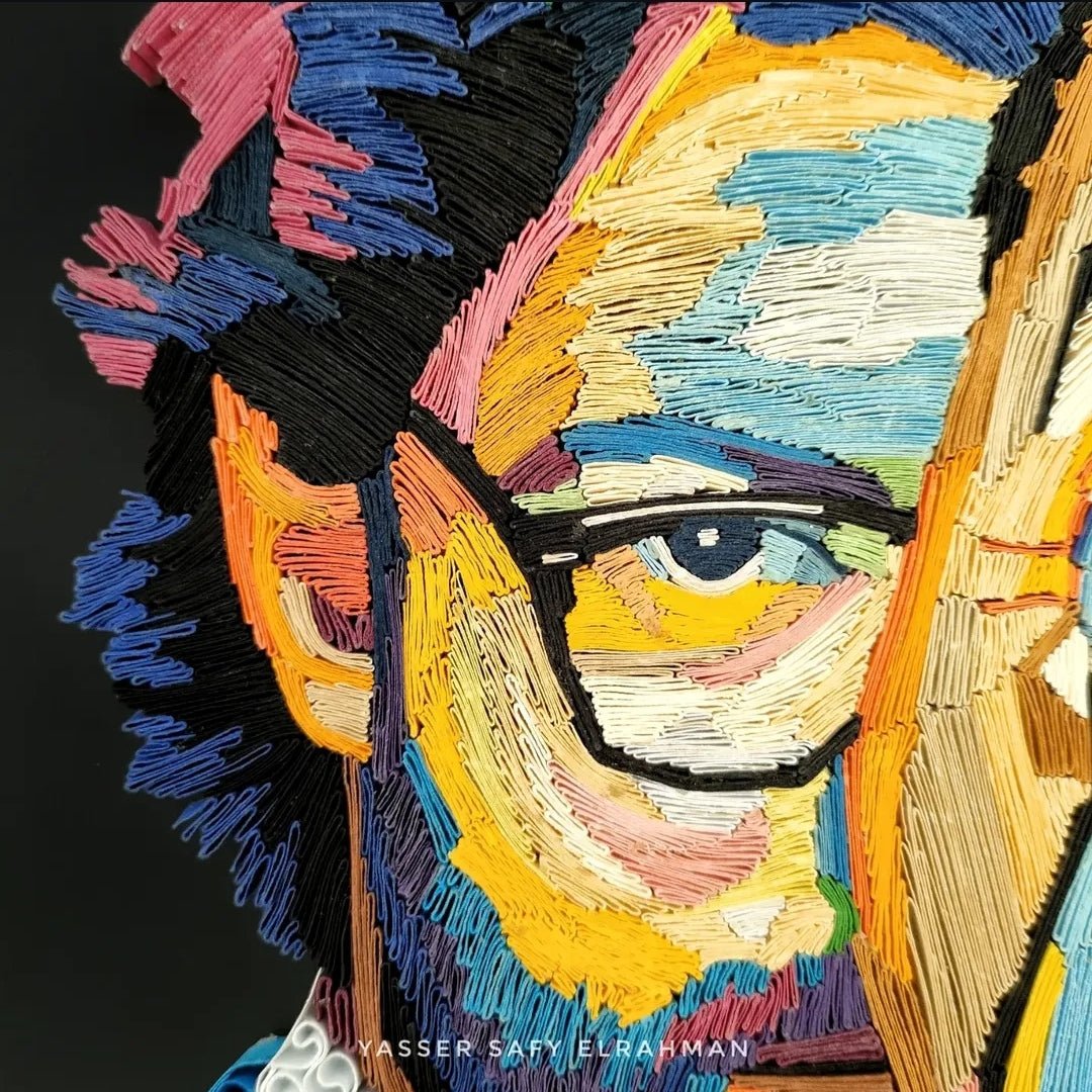 Colorful portrait artwork titled El Profesor: A Mastermind by Yasser Safy Elrahman, showcasing vibrant hues and detailed artistic expression.