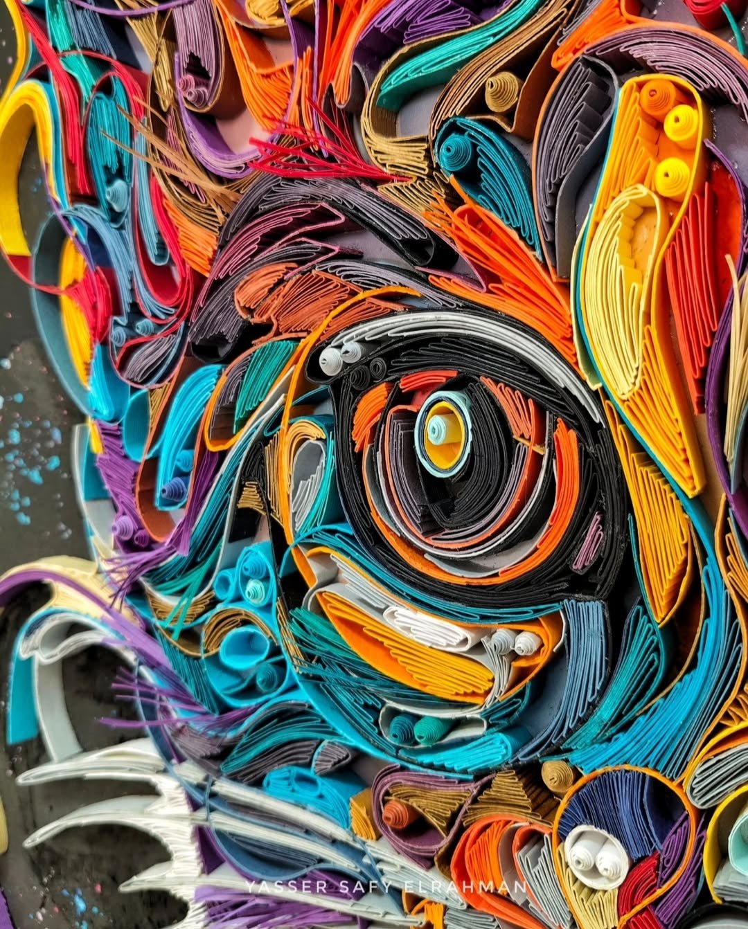 Colorful cat portrait artwork titled James in Colors by Yasser Safy Elrahman, featuring vibrant, artistic feline imagery.