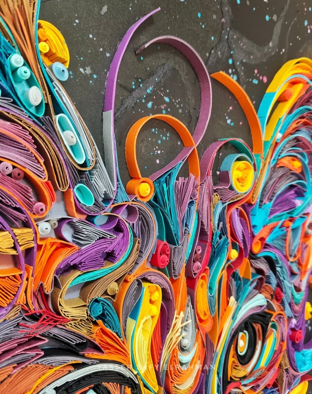 Colorful cat portrait artwork titled "James in Colors" by Yasser Safy Elrahman, featuring vibrant, abstract feline art.