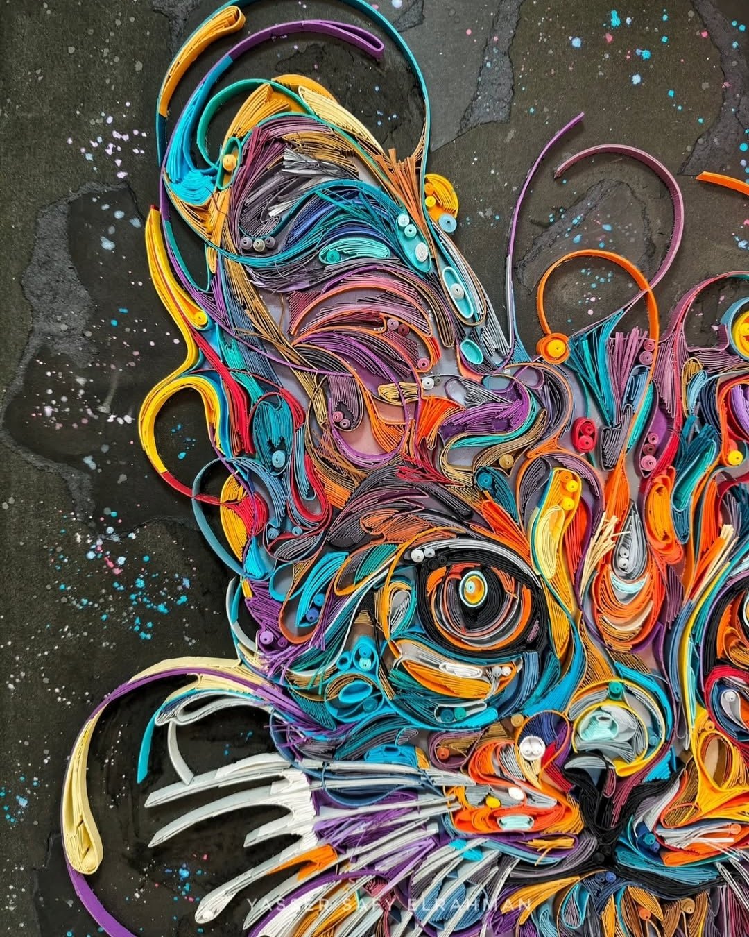 Colorful cat portrait artwork titled James in Colors by Yasser Safy Elrahman, featuring vibrant, artistic feline imagery.