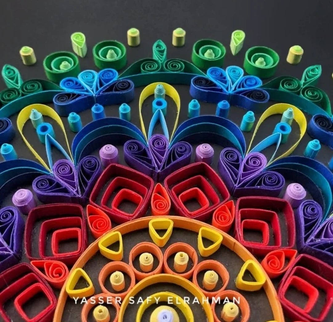 Colorful mandala artwork titled Kaleidoscope of Peace by Yasser Safy Elrahman, featuring intricate geometric patterns and vibrant hues.