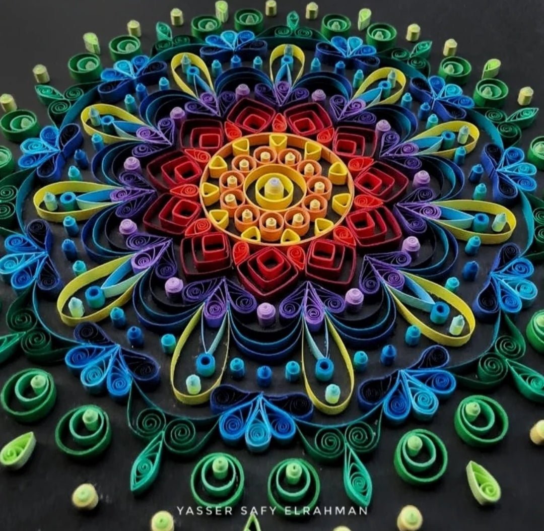 Colorful mandala artwork titled "Kaleidoscope of Peace" by Yasser Safy Elrahman, featuring intricate, vibrant geometric patterns.