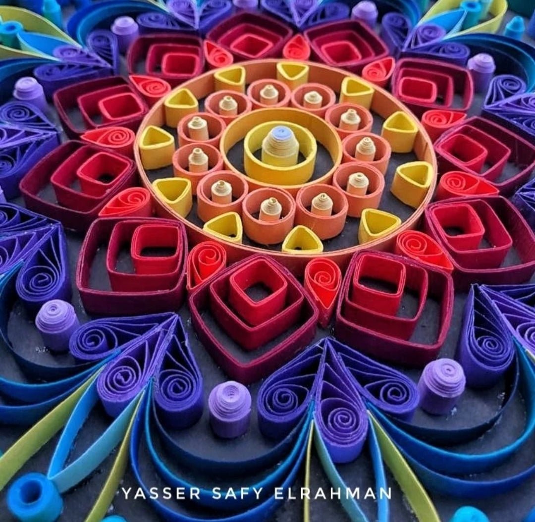 Colorful mandala artwork titled "Kaleidoscope of Peace" by Yasser Safy Elrahman, featuring intricate geometric patterns and vibrant colors.