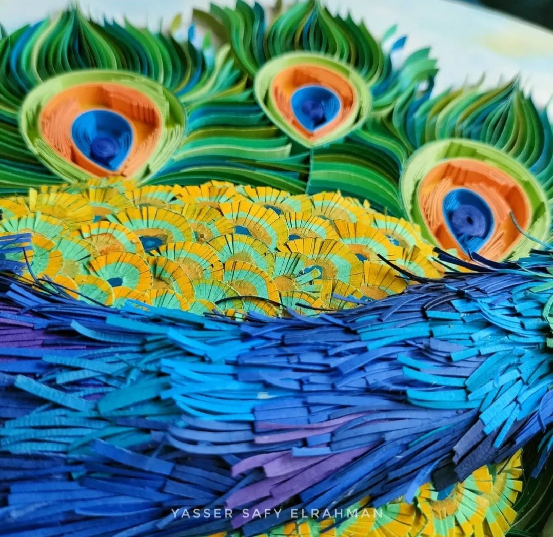 Yasser Safy Elrahman's artwork "Lunablu: The Sapphire Plume Peacock" featuring a vibrant peacock with sapphire blue feathers.