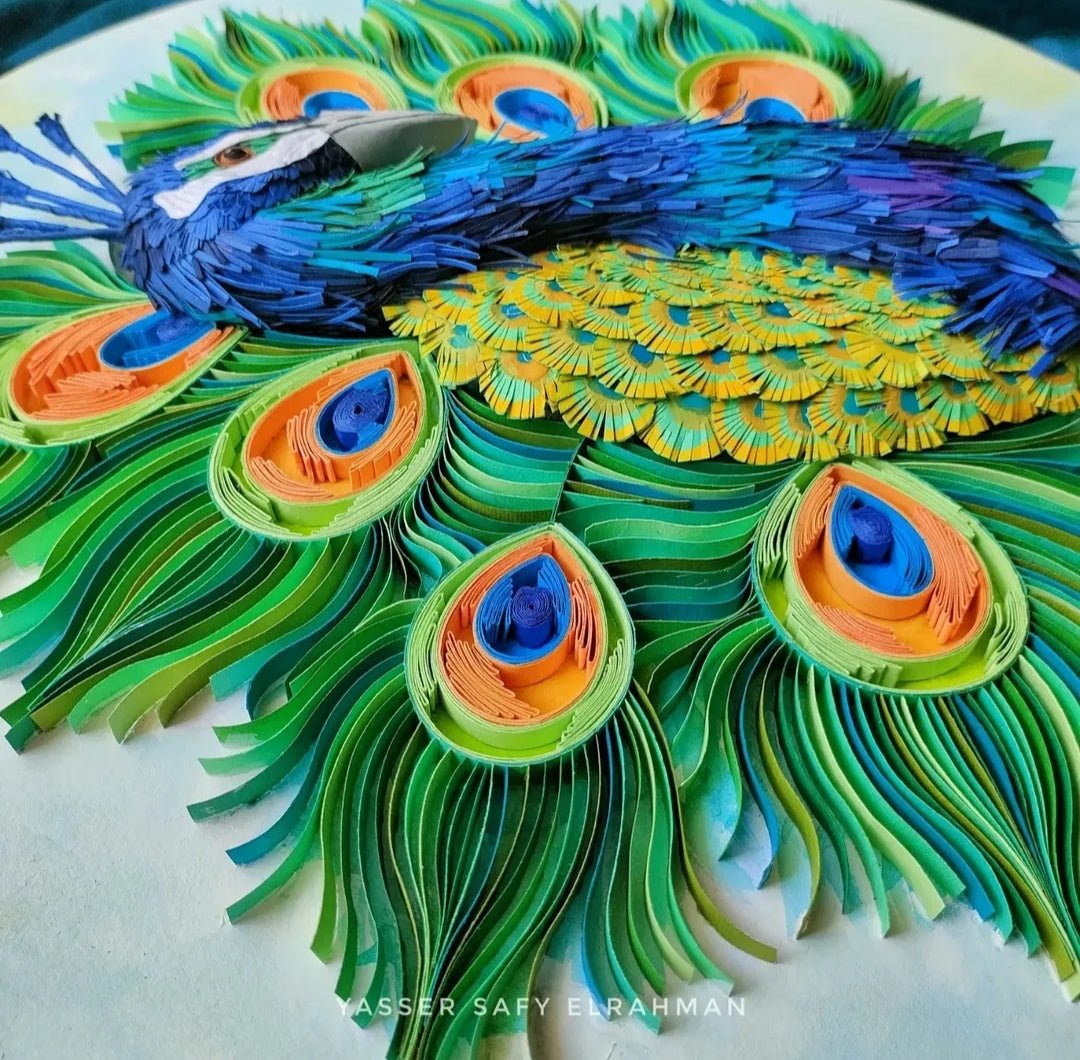 Colorful artwork of a peacock titled Lunablu: The Sapphire Plume by Yasser Safy Elrahman, featuring vibrant blue and sapphire tones.