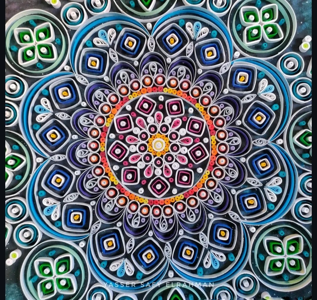 Sacred Mandala Art by Yasser Safy Elrahman featuring intricate mystical geometric patterns and vibrant symmetrical designs.