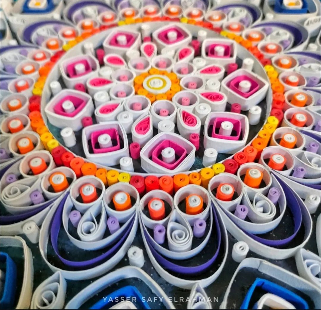 Intricate sacred mandala artwork by Yasser Safy Elrahman showcasing mystical geometric patterns in vibrant colors.