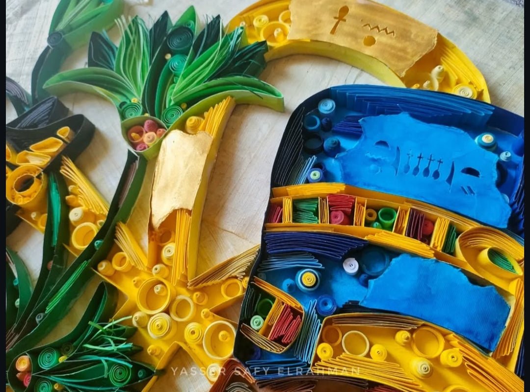 Ancient Egyptian Sacred Life paper quilling artwork by Yasser Safy Elrahman, featuring intricate designs and vibrant colors.