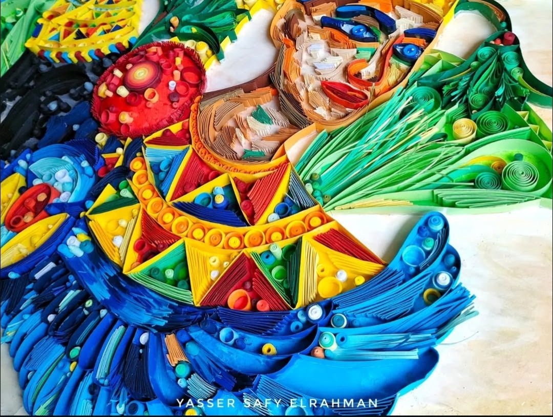 Ancient Egyptian paper quilling artwork titled Nah Nitry (Sacred Life) by Yasser Safy Elrahman, featuring intricate designs and vibrant colors.