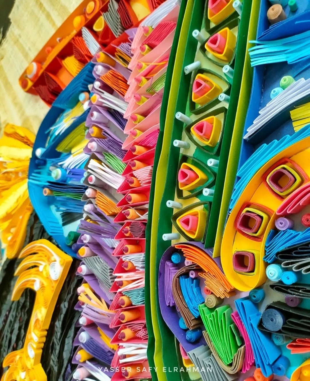 Colorful artwork titled "Nefertari: She is the one for whom the sun shines" by Yasser Safy Elrahman, featuring vibrant Egyptian-inspired imagery.