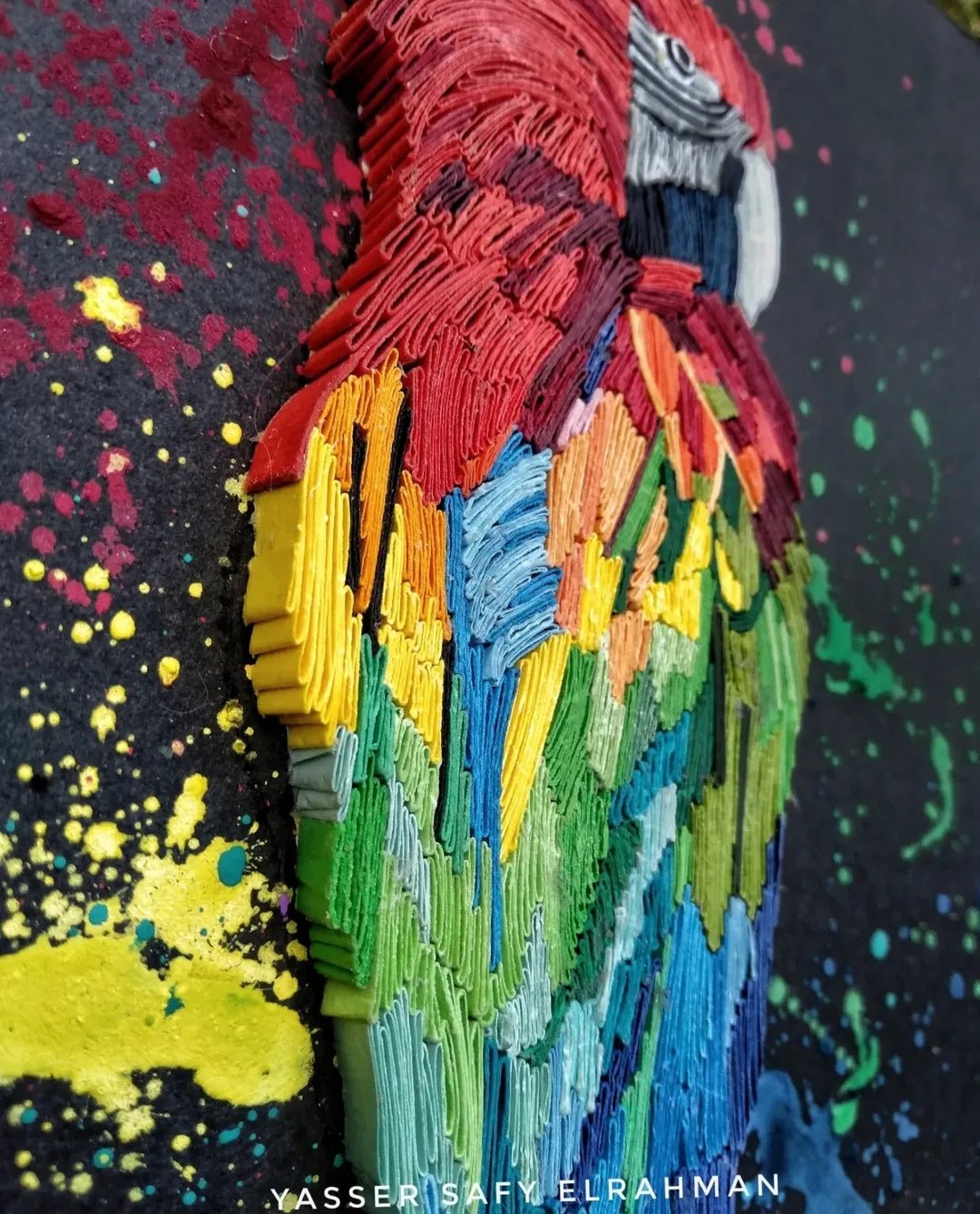 Colorful tropical bird artwork titled "Pappagallino: The Spirit of the Tropics" by Yasser Safy Elrahman.
