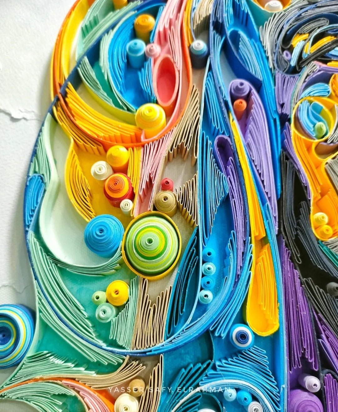Colorful artwork titled "Soul of the Nation - A Tribute to the Legend" by Yasser Safy Elrahman featuring vibrant abstract design.