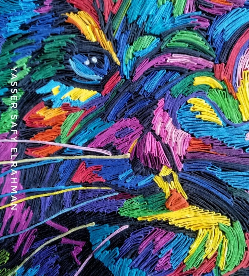 Colorful tiger artwork titled Taigilo: The Sovereign Flare by Yasser Safy Elrahman, featuring vibrant, detailed tiger illustration.