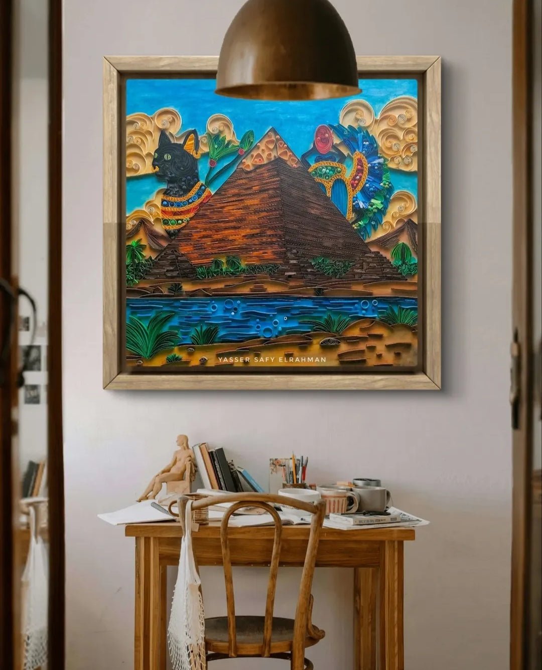 Detailed artwork of The Great Pyramid: Guardians of the Nile by Yasser Safy Elrahman, showcasing ancient Egyptian pyramid imagery.