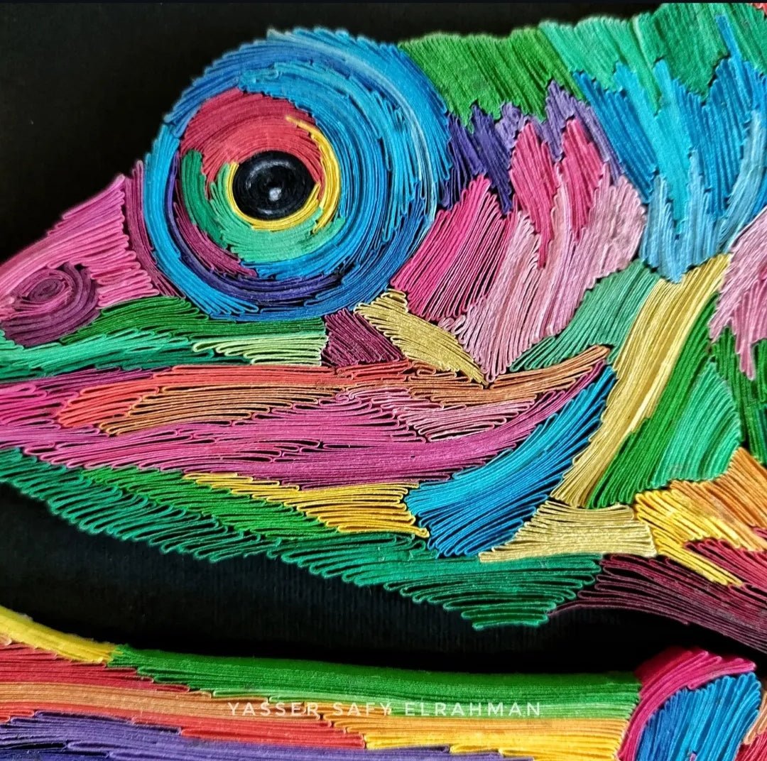 Colorful chameleon mosaic paper quilling artwork by Yasser Safy Elrahman showcasing vibrant, intricate paper designs.