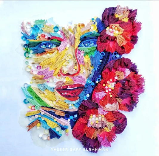 Colorful artwork titled "The Woman in Colors: A Spectrum of Soul" by Yasser Safy Elrahman, featuring vibrant, abstract female portrait.