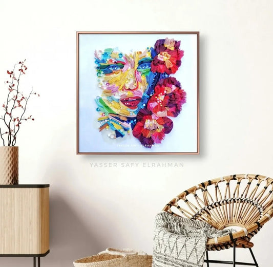 Colorful artwork titled "The Woman in Colors: A Spectrum of Soul" by Yasser Safy Elrahman, featuring a vibrant female portrait.