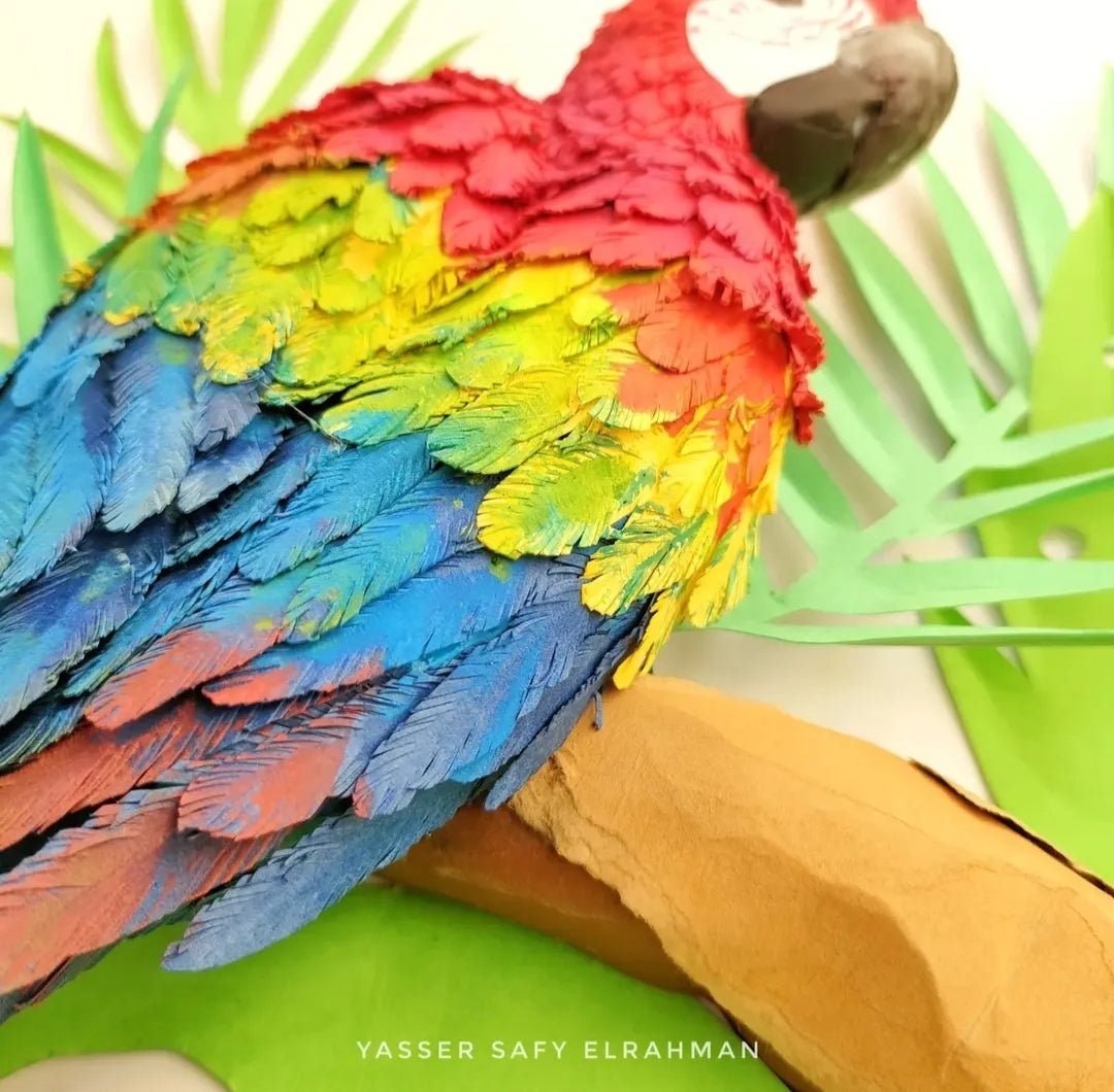 Vivid artwork titled "Parrots of the Tropics" by Yasser Safy Elrahman, featuring colorful tropical parrots in a vibrant portrait.