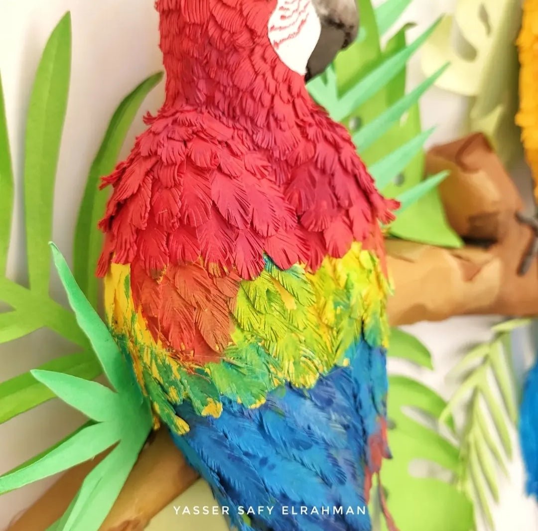 Colorful artwork titled "Tropical Symphony" by Yasser Safy Elrahman featuring vibrant parrots in a tropical setting.