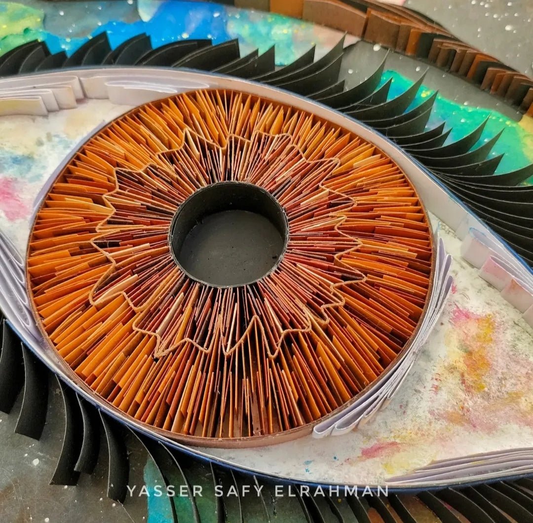 Yasser Safy Elrahman's artwork "Universe's Eye: The Witness of Magnificence" featuring a cosmic eye and vibrant celestial details.