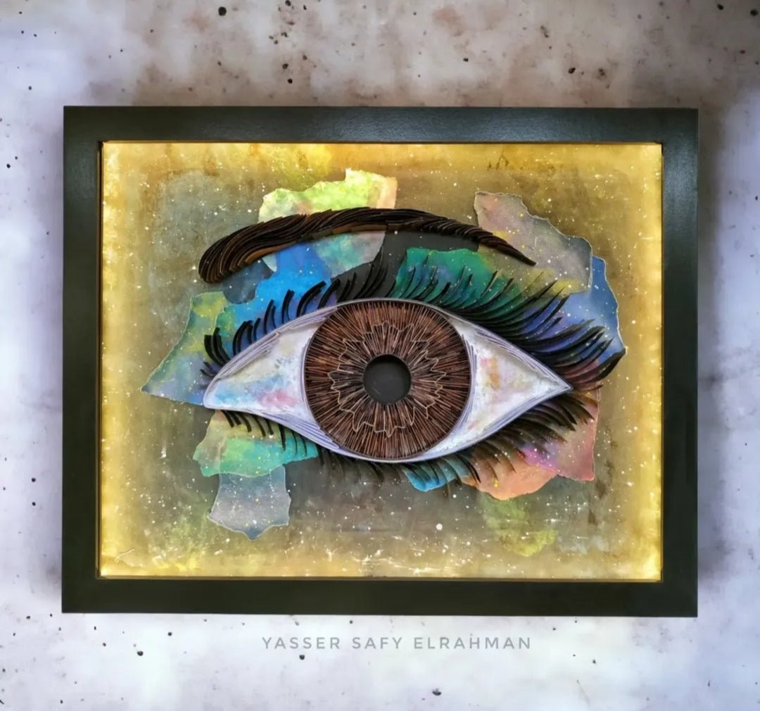 Yasser Safy Elrahman's artwork "Universe's Eye: The Witness of Magnificence" featuring a cosmic eye with vibrant colors and intricate details.