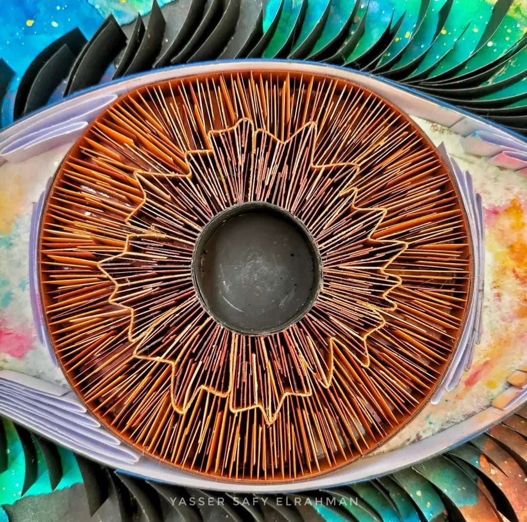 Yasser Safy Elrahman's artwork "Universe's Eye: The Witness of Magnificence" depicting a cosmic eye with vibrant colors and intricate details.